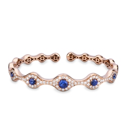 Bracciale semi rigido ondulato in oro rosa 18k con zaffiri blu e diamanti
