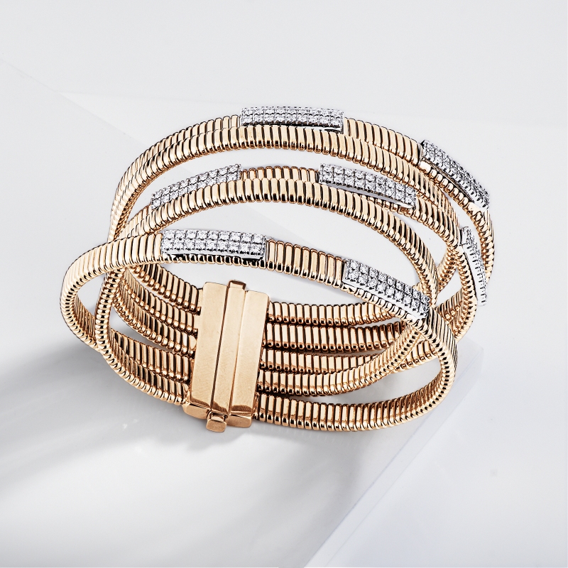 Bracciale tubogas 5 file in oro giallo e bianco 18k con diamanti