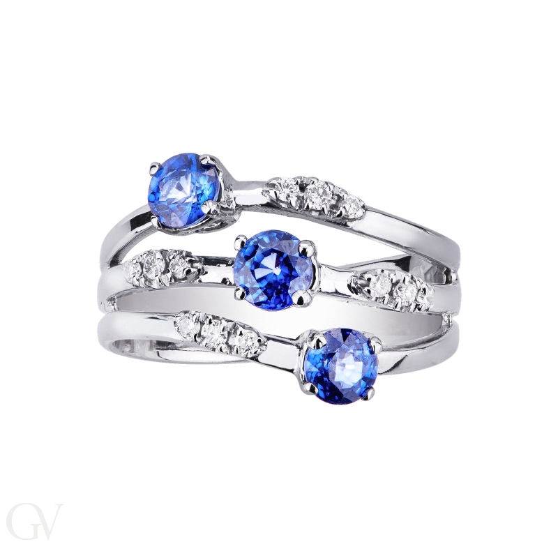 18k white gold band ring wave shaped with diamonds and blue sapphires 
