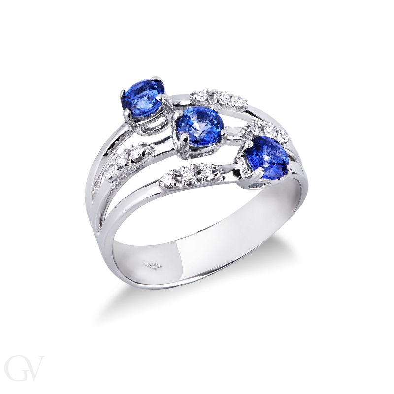 18k white gold band ring wave shaped with diamonds and blue sapphires 