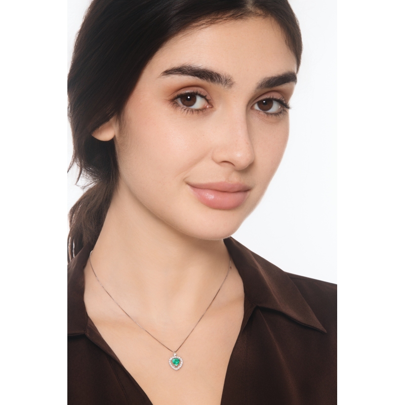 Halo necklace with emerald and diamonds
