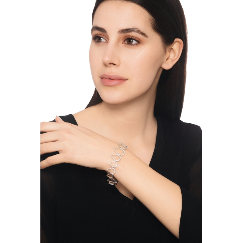 Bracciale fantasia goccia in oro bianco 18k con diamanti