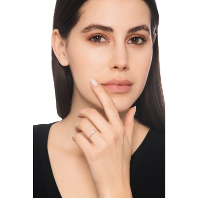 Solitario griffe a 4 punte in oro bianco 18k con Diamante di ct. 0,20