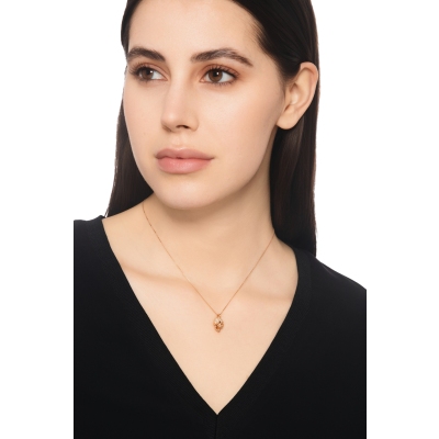 18k rose gold skull with black and white diamonds