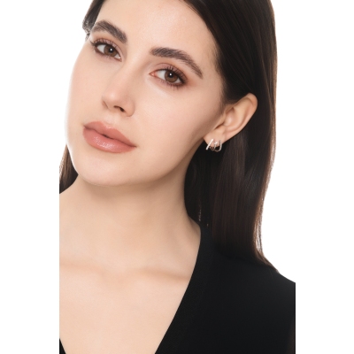 Orecchini mezza curva in oro bianco 18k con diamanti