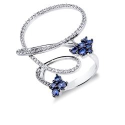 Anello con design floreale in oro bianco 18k con zaffiri blu e diamanti