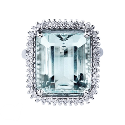 Halo ring with an aquamarine octagonal cut and halo diamonds 