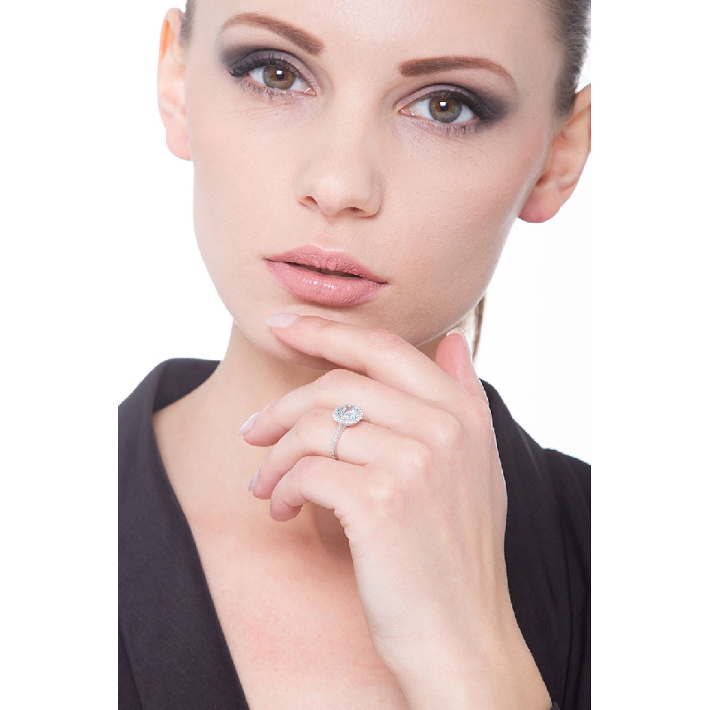 White gold 18k halo ring with aquamarine and diamonds 