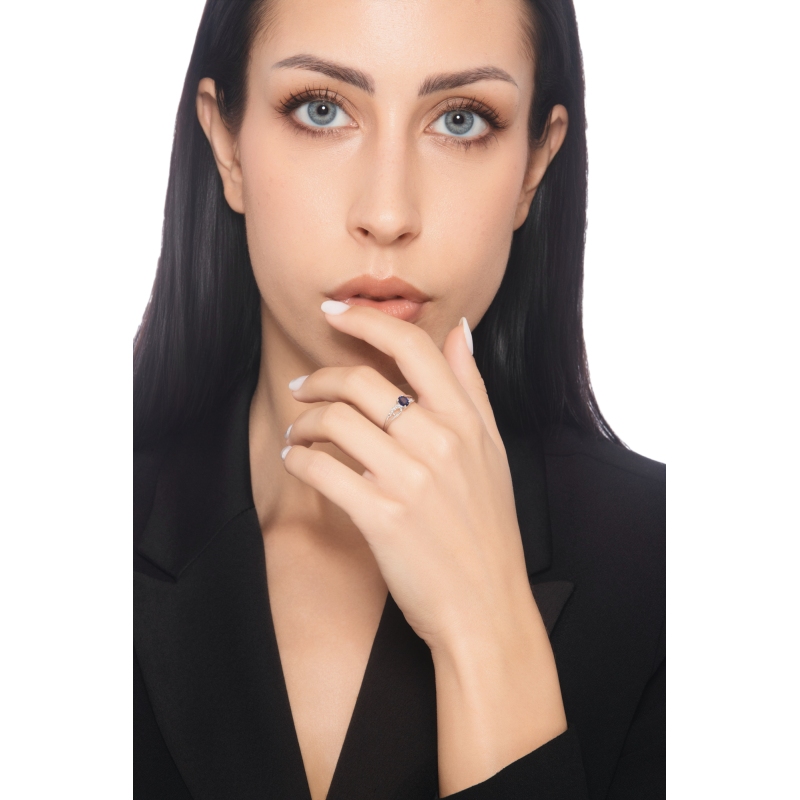 White gold 18k ring with a tangle of blue sapphire and diamonds 