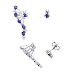 Orecchini asimmetrici design in oro bianco 18k con zaffiri blu e diamanti