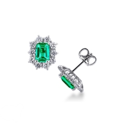 Halo stud earrings with emeralds and diamonds in white gold 18k
