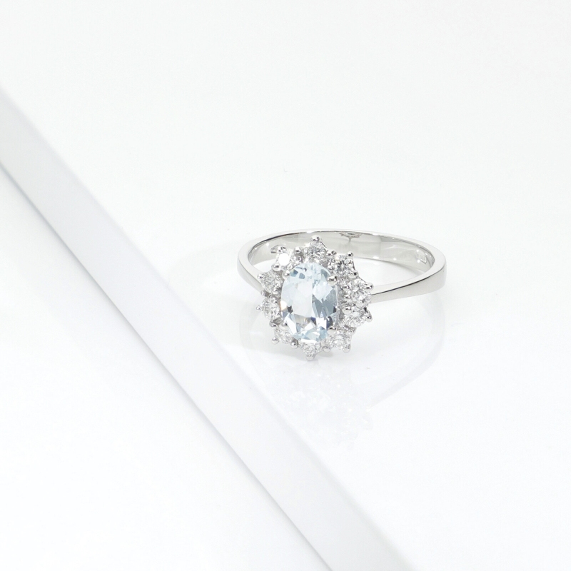 ANELLO CONTORNO CON 10BRILLANTI E ACQUAM. OVALE MM7X5 CIRCA