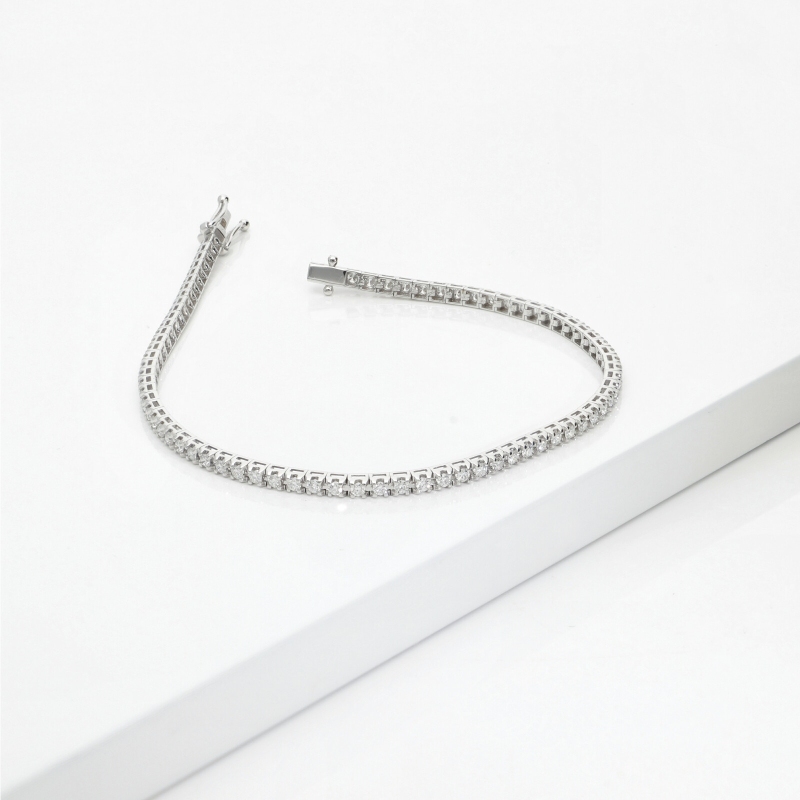 TENNIS GRIFF PIRAMIDE LEGGERO CON BRILL 0.02CT.LARGH. 2.20MM CIRCA.  VED.MISURE