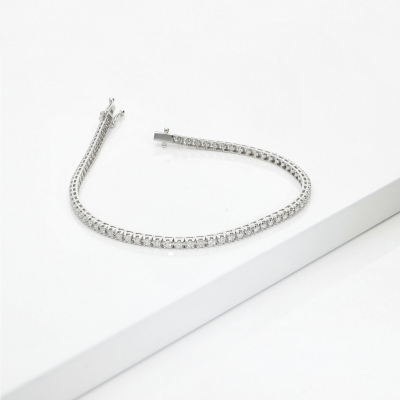 TENNIS GRIFF PIRAMIDE LEGGERO CON BRILL 0.02CT.LARGH. 2.20MM CIRCA.  VED.MISURE