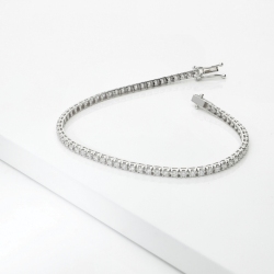 TENNIS GRIFF PIRAMIDE LEGGERO CON BRILL 0.03CT LARGH. 2.40MM CIRCA.  VED.MISURE