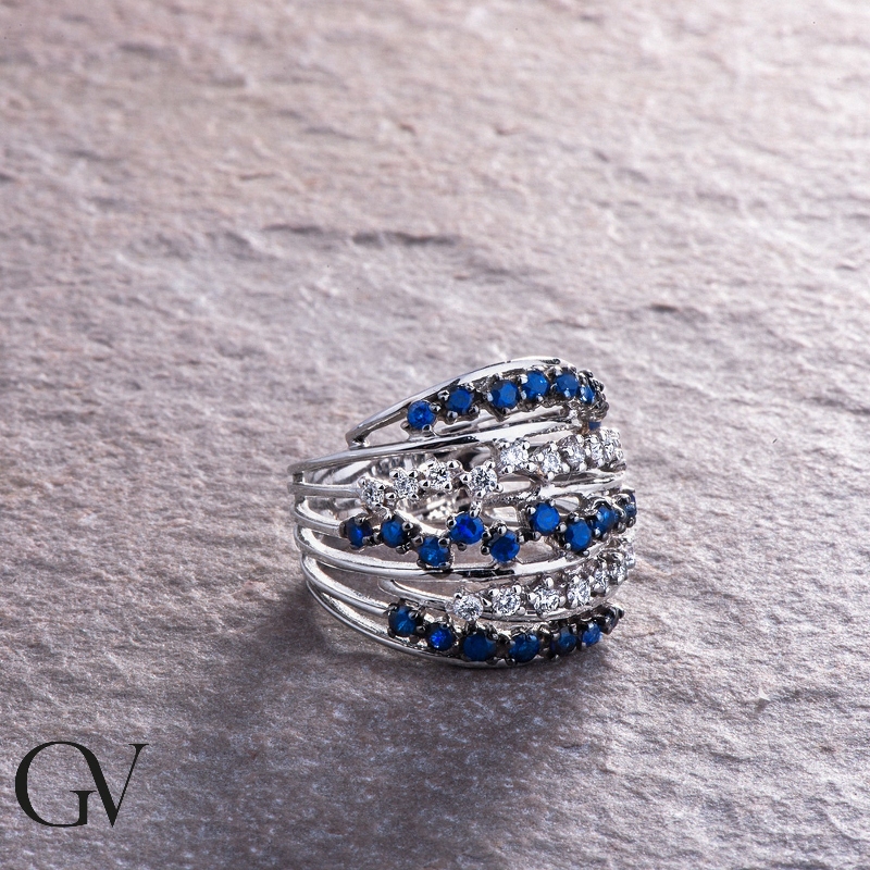 Band ring in white gold 18k with diamonds and blue sapphires