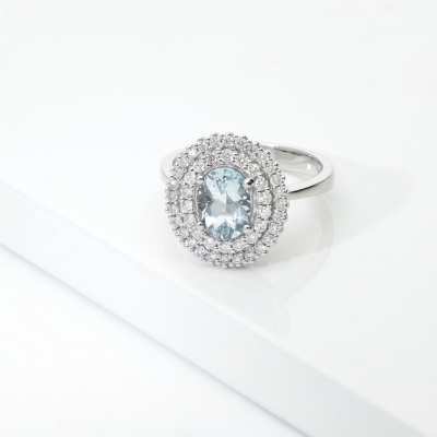 Anello in oro bianco 750 con diamanti e acquamarina ovale