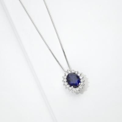 Collana zaffiro blu ovale e diamanti in oro bianco 18k