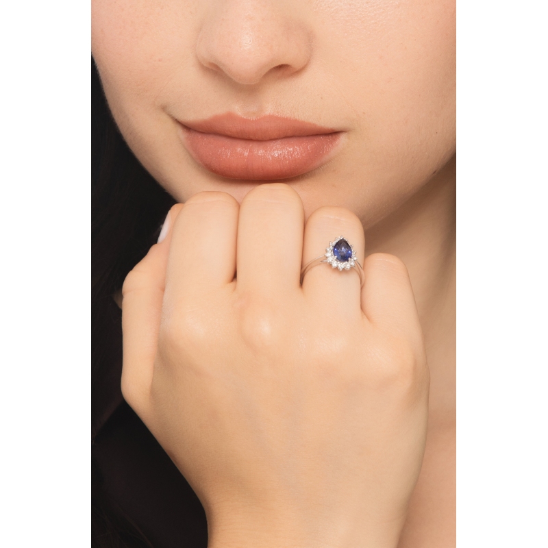 Anello contorno in oro bianco 750 con zaffiro blu e diamanti