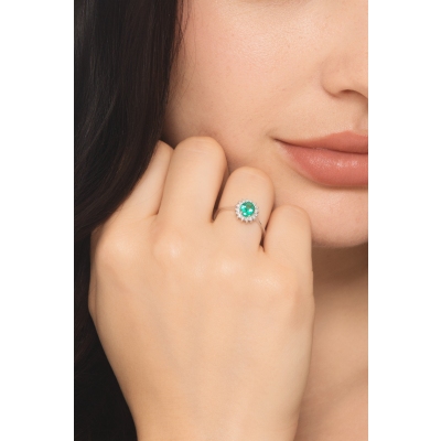 ANELLO CONTORNO CON 16BRILLANTI E SMERALDO TAGLIO OVALE MM6X5