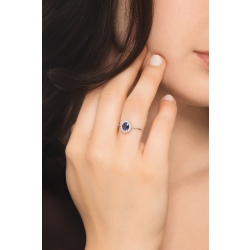 Anello in oro bianco 18k con diamanti e zaffiro blu ovale 2