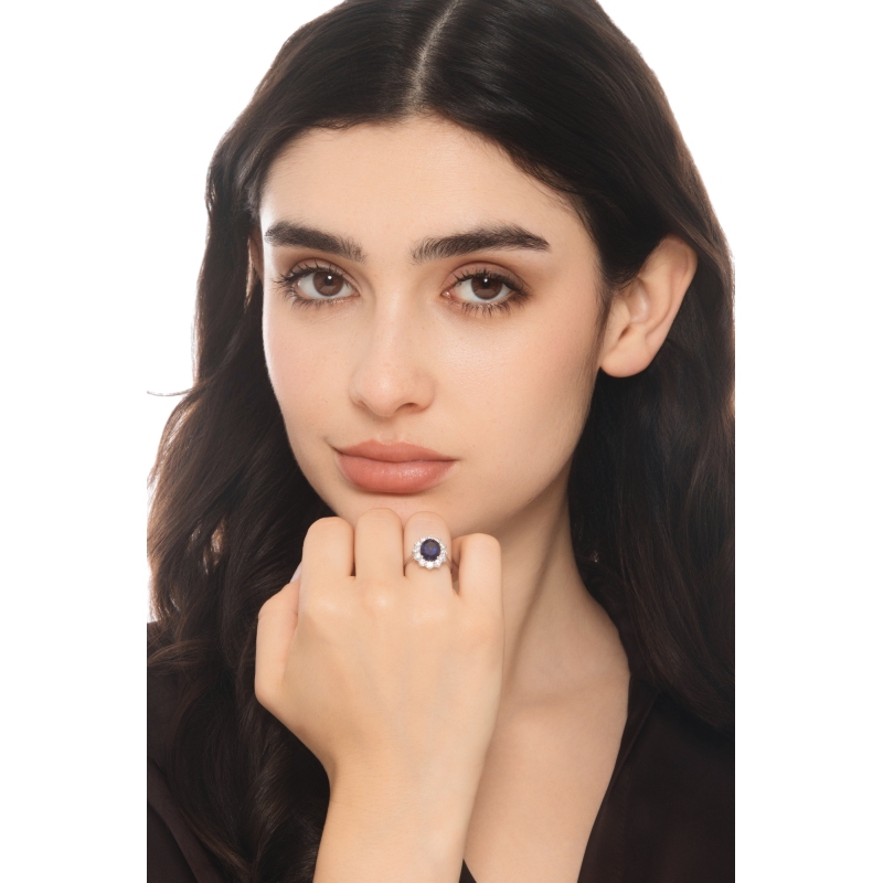 Anello in oro bianco 750 con diamanti e zaffiro blu ovale