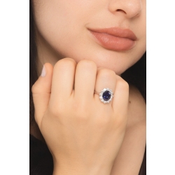 Anello in oro bianco 750 con diamanti e zaffiro blu ovale 2