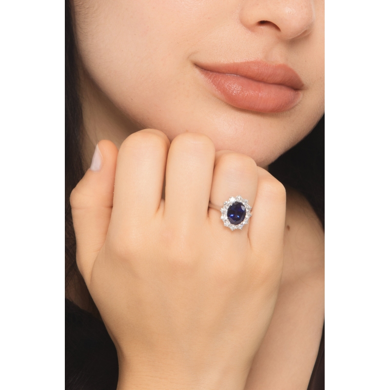 Anello in oro bianco 750 con diamanti e zaffiro blu ovale