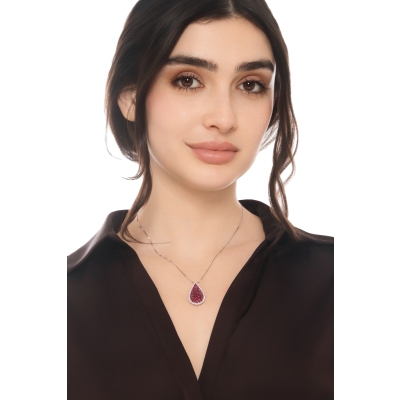 Collana in oro bianco 18k con ciondolo a goccia pavè brunito in rubini e diamanti