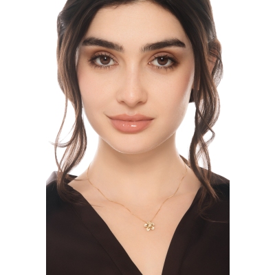 Collana fiore in oro giallo 18k con diamanti
