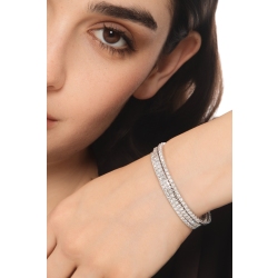 Bracciale stretch a molla in oro bianco 18k con diamanti taglio brillante e princess 2