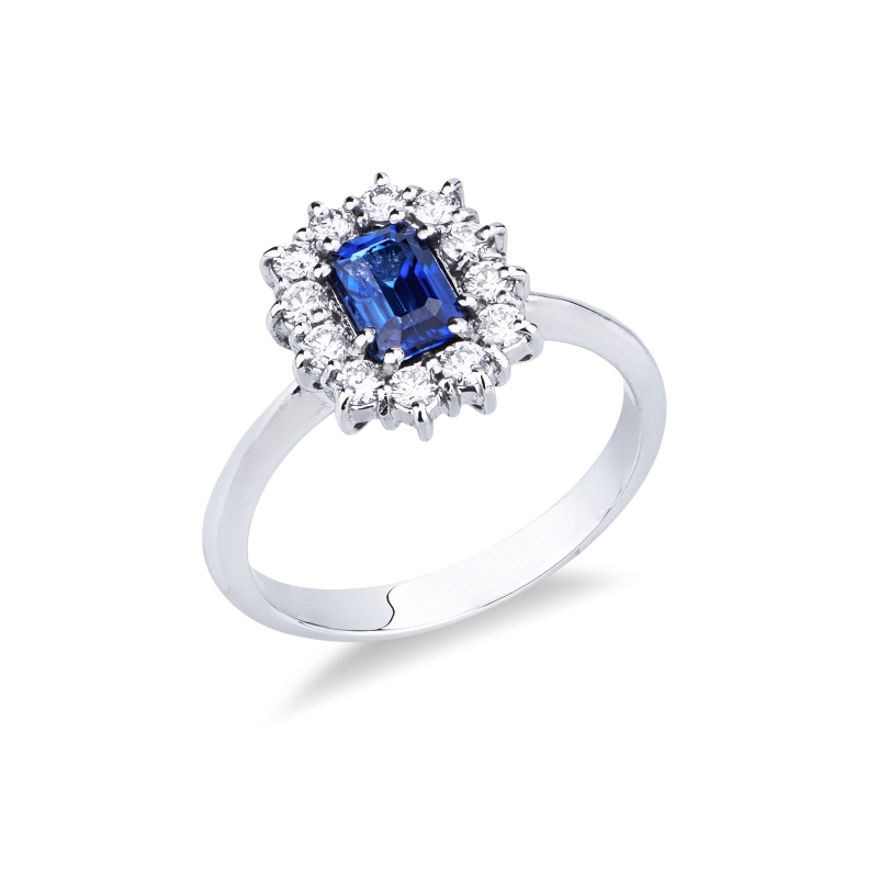 White gold 18k halo ring with diamonds and central blue sapphire 