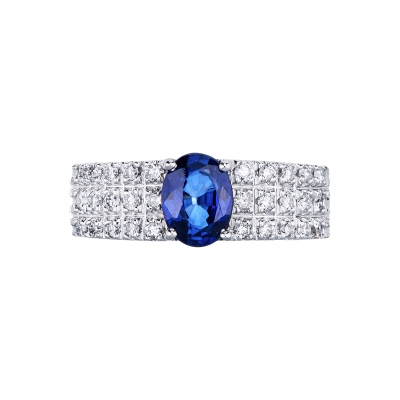 Anello a fascia in oro bianco 18k con zaffiro blu e tre file in diamanti