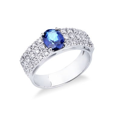 Anello a fascia in oro bianco 18k con zaffiro blu e tre file in diamanti