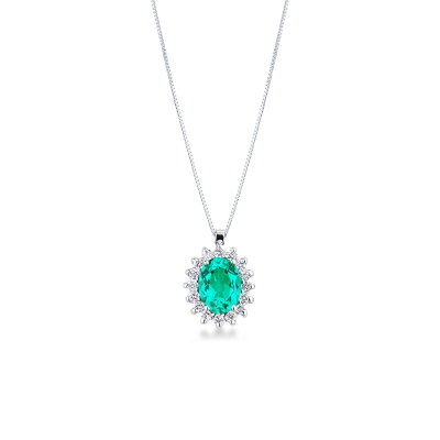 CIONDOLO CONTORNO 16BRILLANTI CON SMERALDO OVALE MM8X6.