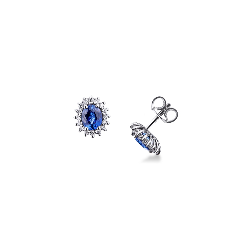 Orecchini a contorno oro bianco 18k con zaffiro ovale blu e diamanti 