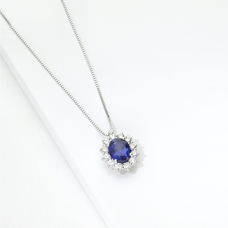 Collana rosetta in oro bianco 18k con zaffiro blu e diamanti 
