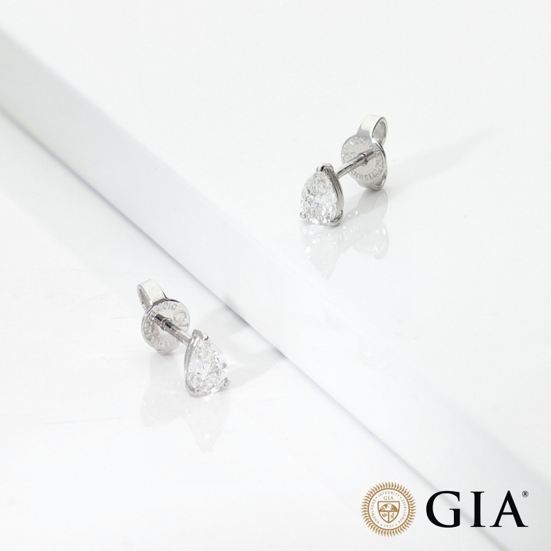 Orecchini punto luce goccia in oro bianco 18k con diamante GIA