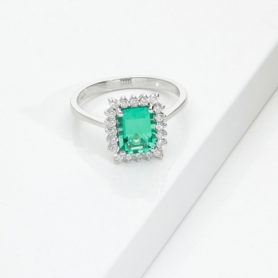 ANELLO CONTORNO CON 20BRILL E SMERALDO TAGLIO RETTANGOLARE MM8X6