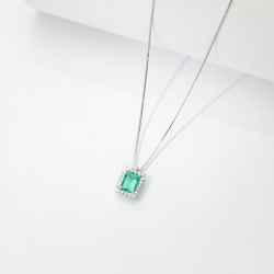 Necklace with pendant, emerald and round cut diamonds