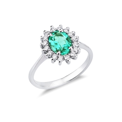 18k white gold ring with emerald oval cut and diamonds
