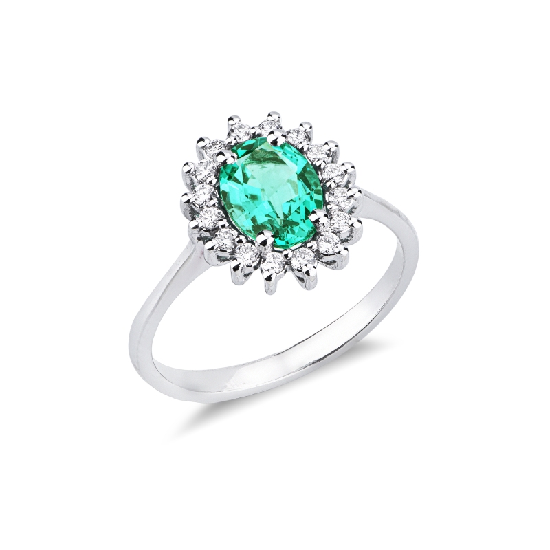 18k white gold ring with emerald oval cut and diamonds