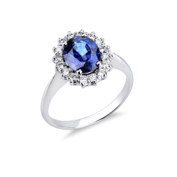 Anello contorno in oro bianco 18k con zaffiro ovale blu e diamanti