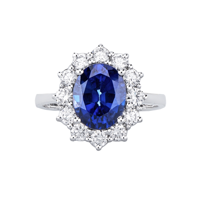 Anello in oro bianco 750 con diamanti e zaffiro blu ovale