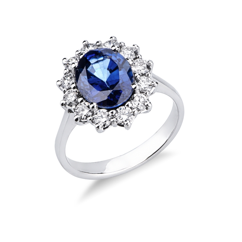 Anello in oro bianco 750 con diamanti e zaffiro blu ovale