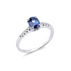 18k white gold ring with side diamonds and central blue sapphire