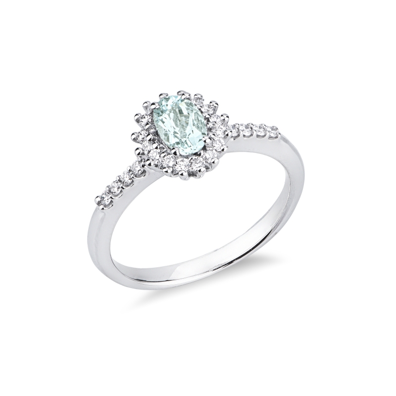 Anello in oro bianco 18k con acquamarina ovale e halo di diamanti