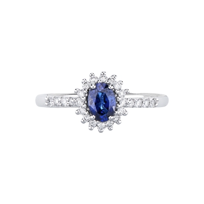 Anello in oro bianco 18k con zaffiro ovale e halo di diamanti