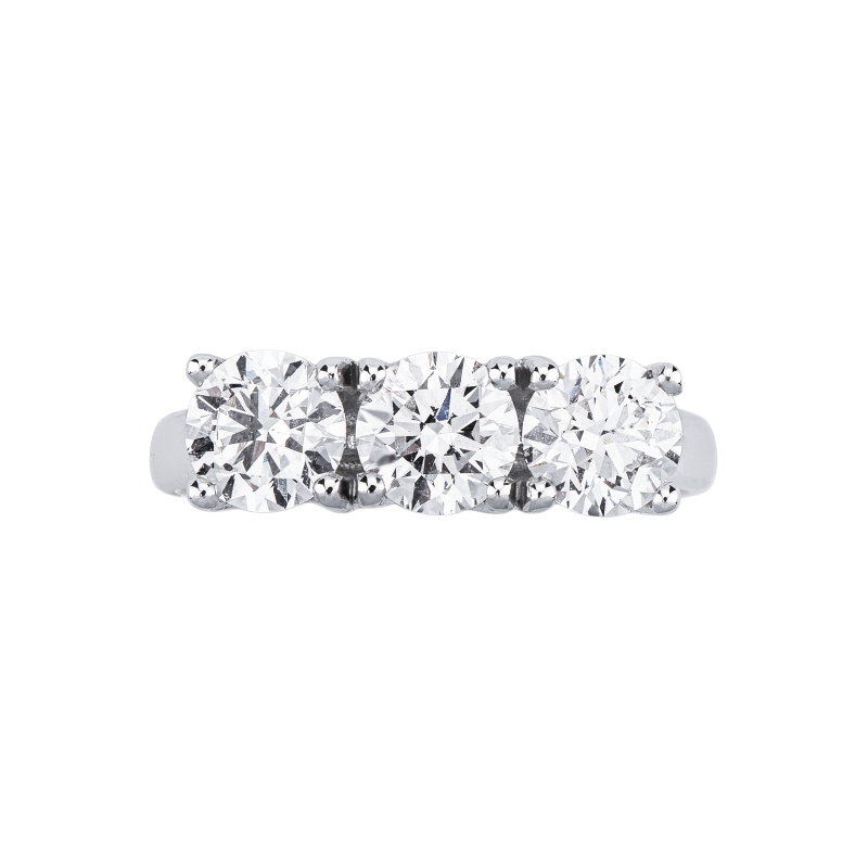 Anello trilogy lineare in oro bianco 18k con tre diamanti