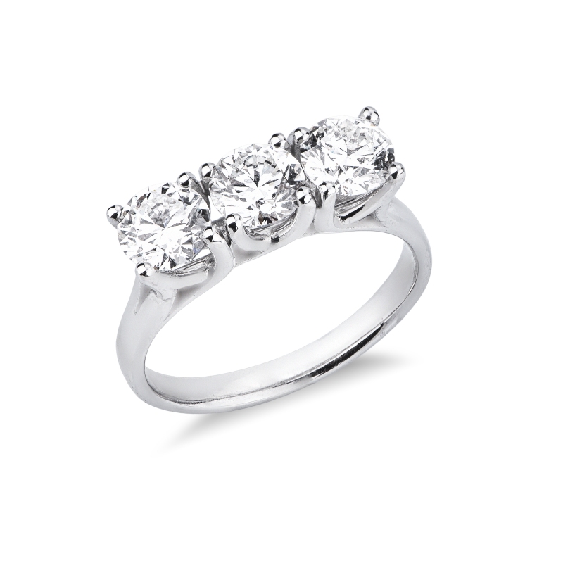 Anello trilogy lineare in oro bianco 18k con tre diamanti